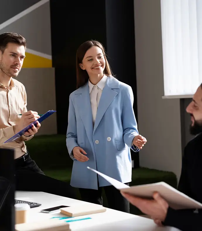 Team discussing work in a modern office