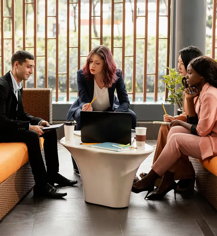 Colleagues meeting in a bright office